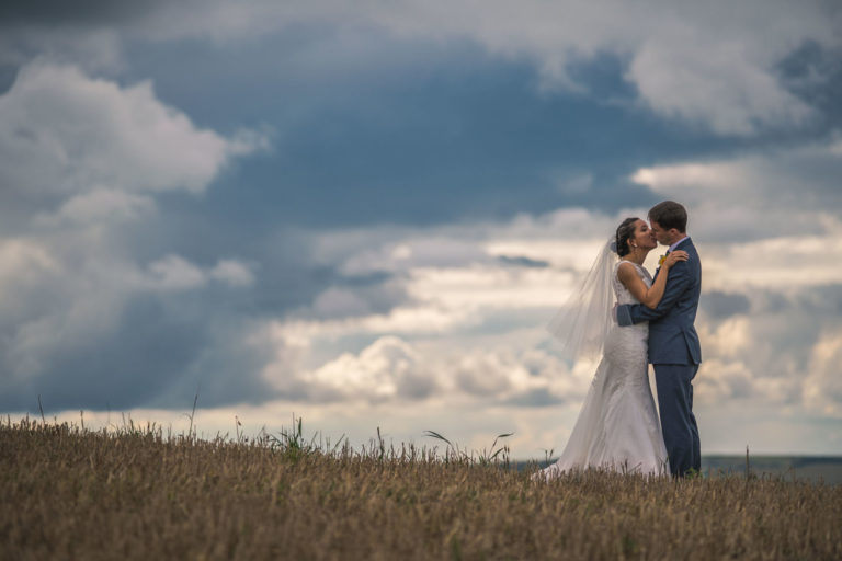 lee-hawley-photography-naomi-nim-tim-wedding-photography-photographer-gloucestershire-natural-cadid-creative-bentley-cheltenham-hill-couples-hero-shot-sky_orig